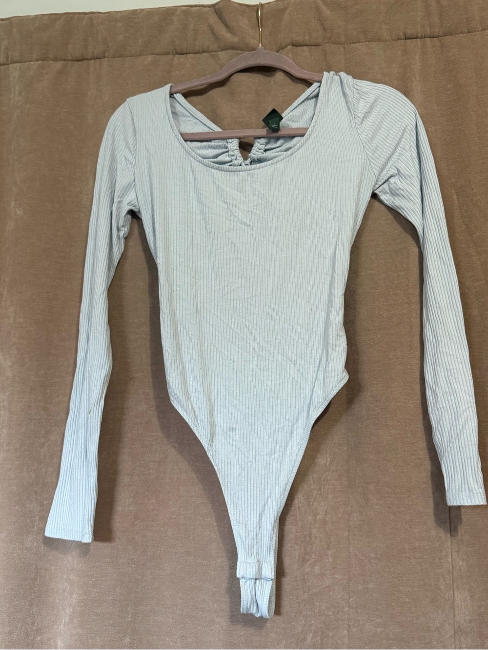 Woman’s Light Blue Backless Ribbed Long-Sleeve One-Piece Bodysuit